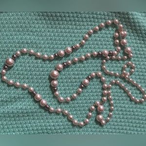 Pearl necklace, with a few chrome beads in between.